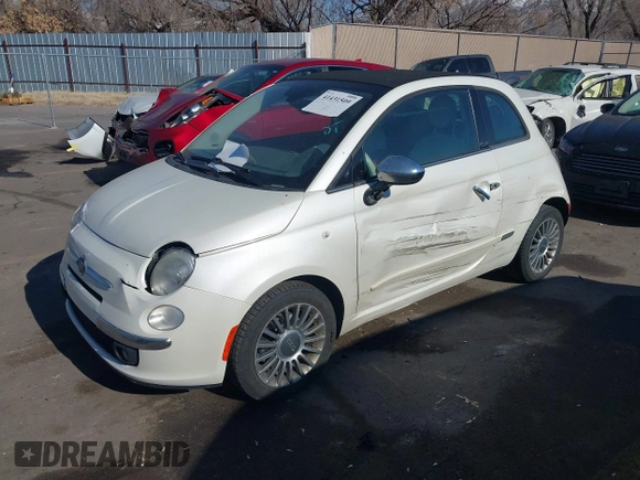 2012 FIAT 500 Lounge z VIN 3C3CFFER7CT119147, wystawiony jako IAAI lot #41431509 z przebiegiem 140 084 mil mil oraz . Historia ofert i sprzedaży dostępna na DreamBid. Obrazek 2.