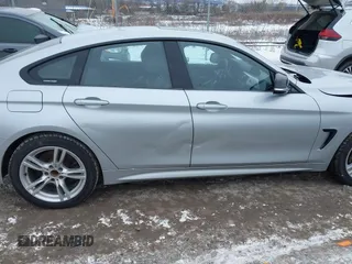 2016 BMW 4 Series 428i xDrive with VIN WBA4C9C53GG136870, listed as a IAAI auction lot 41410071 with 116,187 mi miles and . Bid and sale history available at DreamBid. Image 17.