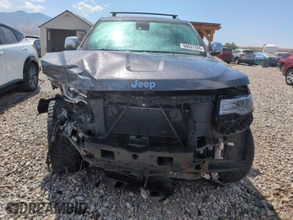 2014 Jeep Grand Cherokee Summit with VIN 1C4RJFJM8EC395169, listed as a Copart auction lot 60637265 with 116,575 mi miles and Salvage title. Bid and sale history available at DreamBid. Image 5.