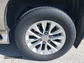 2014 Lexus GX with VIN JTJBM7FX7E5068037, listed as a IAAI auction lot 42069809 with 120,791 mi miles. Bid and sale history available at carsss.com. Image 12.
