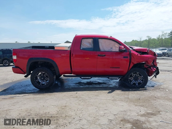 2017 Toyota Tundra SR z VIN 5TFUY5F10HX677527, wystawiony jako IAAI lot #42157357 z przebiegiem 43 111 mil mil oraz . Historia ofert i sprzedaży dostępna na DreamBid. Obrazek 13.