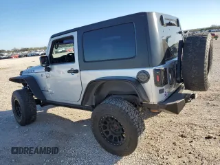 2009 Jeep Wrangler Rubicon with VIN 1J8GA64159L700909, listed as a Copart auction lot 86308954 with 138,065 mi miles and Salvage title. Bid and sale history available at DreamBid. Image 2.