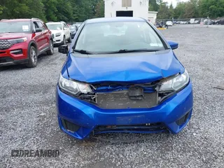 2015 Honda Fit LX with VIN 3HGGK5G59FM711808, listed as a IAAI auction lot 42655848 with 169,780 mi miles and . Bid and sale history available at DreamBid. Image 6.