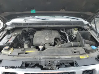 2015 Nissan Titan SV z VIN 1N6AA0EC5FN513631, wystawiony jako Copart lot #61260425 z przebiegiem 160 408 mil mil oraz Szkoda całkowita • Salvage title. Historia ofert i sprzedaży dostępna na DreamBid. Obrazek 11.