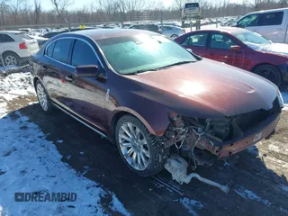 2012 Lincoln MKS with VIN 1LNHL9ER7CG803675, listed as a IAAI auction lot 41622367 with 128,157 mi miles. Bid and sale history available at carsss.com. Image 1.