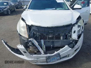2012 Cadillac SRX Performance Collection with VIN 3GYFNBE34CS659748, listed as a IAAI auction lot 42693814 with 216,854 mi miles and . Bid and sale history available at DreamBid. Image 6.