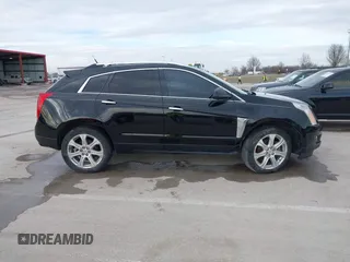 2013 Cadillac SRX Performance Collection with VIN 3GYFNHE34DS595277, listed as a IAAI auction lot 41618126 with 118,141 mi miles. Bid and sale history available at carsss.com. Image 13.