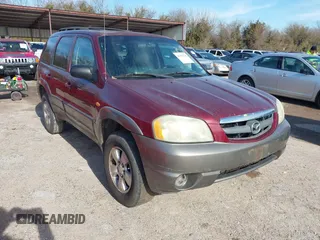 2003 Mazda Tribute ES with VIN 4F2CZ06133KM09847, listed as a IAAI auction lot 41325736 with Not Provided miles. Bid and sale history available at carsss.com. Image 1.