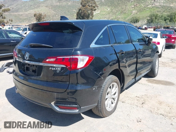 2017 Acura RDX w/Technology Pkg with VIN 5J8TB3H56HL007488, listed as a IAAI auction lot 41818703 with 69,082 mi miles. Bid and sale history available at carsss.com. Image 4.