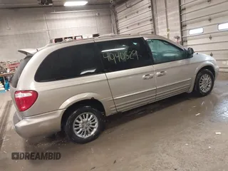 2003 Chrysler Town & Country Limited with VIN 2C8GP64L23R252570, listed as a IAAI auction lot 41940529 with 105,780 mi miles. Bid and sale history available at carsss.com. Image 4.