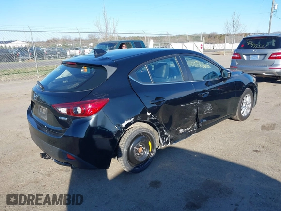 2014 Mazda 3 i Grand Touring with VIN JM1BM1M70E1211906, listed as a IAAI auction lot 41878585 with 112,013 mi miles and . Bid and sale history available at DreamBid. Image 4.