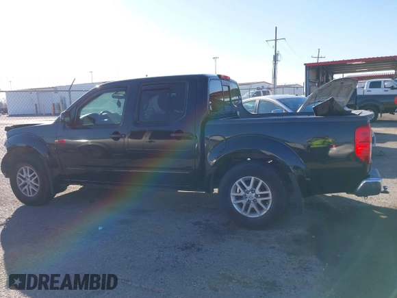 2019 Nissan Frontier SV with VIN 1N6DD0ER6KN767674, listed as a IAAI auction lot 41742210 with 73,238 mi miles and . Bid and sale history available at DreamBid. Image 14.