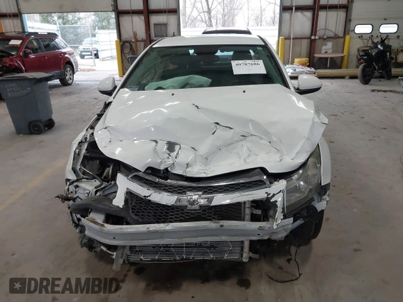 2014 Chevrolet Cruze 1LT with VIN 1G1PC5SB2E7182213, listed as a IAAI auction lot 40787686 with 129,882 mi miles and . Bid and sale history available at DreamBid. Image 12.