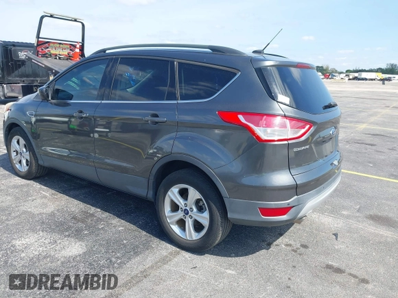 2016 Ford Escape SE with VIN 1FMCU0GXXGUB66870, listed as a IAAI auction lot 42219454 with 116,158 mi miles and . Bid and sale history available at carsss.com. Image 3.