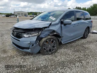 2025 Honda Odyssey Touring with VIN 5FNRL6H82SB025532, listed as a Copart auction lot 56985605 with 2,756 mi miles and Salvage title. Bid and sale history available at DreamBid. Image 1.