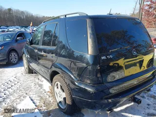 2001 Mercedes-Benz M-Class AMG with VIN 4JGAB74E71A255572, listed as a IAAI auction lot 41415938 with 78,185 mi miles. Bid and sale history available at carsss.com. Image 3.