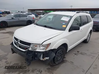 2020 Dodge Journey SE Value with VIN 3C4PDCAB4LT254595, listed as a IAAI auction lot 41572159 with 124,804 mi miles and . Bid and sale history available at carsss.com. Image 2.