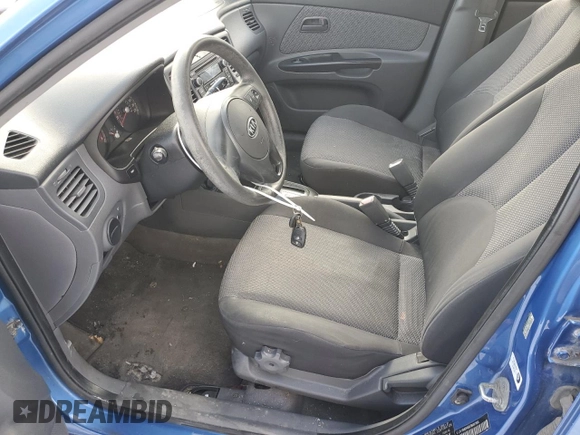 2011 Kia Rio with VIN KNADH4B37B6917894, listed as a Copart auction lot 88465075 with 229,688 mi miles and Clean Title. Bid and sale history available at DreamBid. Image 7.