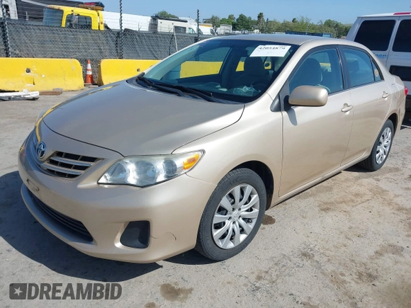 2013 Toyota Corolla L with VIN 5YFBU4EE2DP209907, listed as a IAAI auction lot 42054879 with 150,977 mi miles and . Bid and sale history available at DreamBid. Image 2.