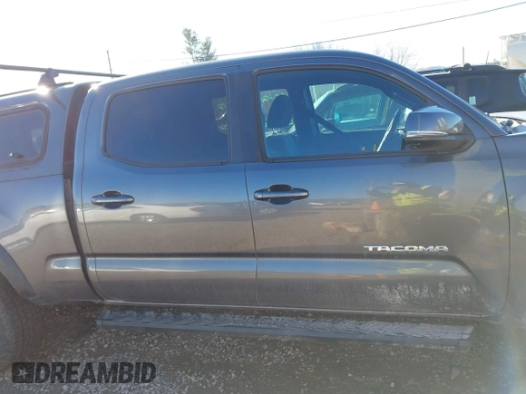 2021 Toyota Tacoma 4WD SR5 with VIN 5TFDZ5BN8MX058531, listed as a IAAI auction lot 41628820 with 102,004 mi miles. Bid and sale history available at carsss.com. Image 13.