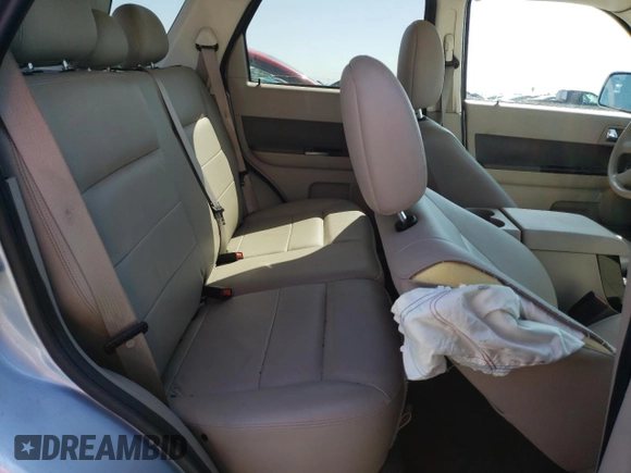 2009 Ford Escape Hybrid z VIN 1FMCU49309KA30344, wystawiony jako Copart lot #55644835 z przebiegiem 112 641 mil mil oraz Szkoda całkowita • Salvage title. Historia ofert i sprzedaży dostępna na DreamBid. Obrazek 11.