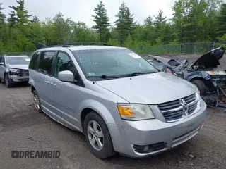 2009 Dodge Grand Caravan SXT z VIN 2D8HN54139R615585, wystawiony jako IAAI lot #42334638 z przebiegiem 129 672 mil mil oraz . Historia ofert i sprzedaży dostępna na DreamBid. Obrazek 1.