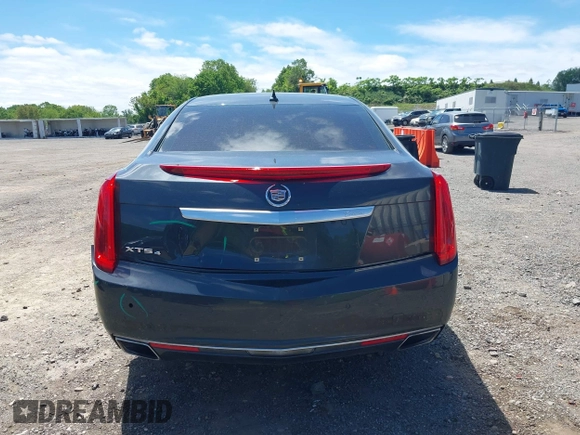 2013 Cadillac XTS Luxury z VIN 2G61R5S33D9101434, wystawiony jako IAAI lot #42290199 z przebiegiem 48 075 mil mil oraz . Historia ofert i sprzedaży dostępna na DreamBid. Obrazek 16.
