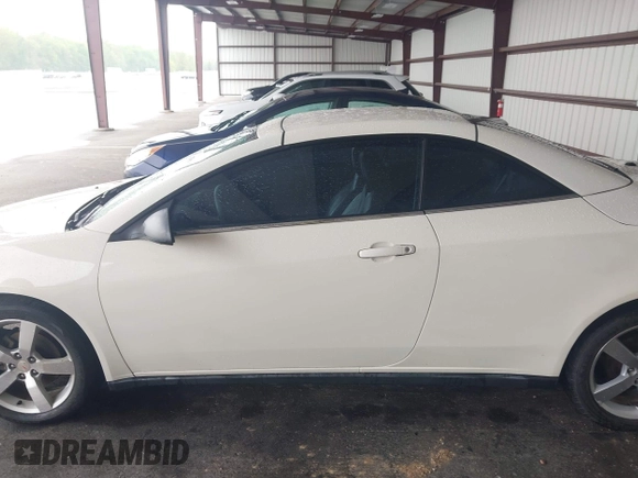 2007 Pontiac G6 GT with VIN 1G2ZH361X74169547, listed as a IAAI auction lot 42113613 with 114,781 mi miles and . Bid and sale history available at DreamBid. Image 14.