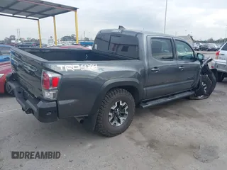 2021 Toyota Tacoma SR z VIN 3TMCZ5AN9MM397611, wystawiony jako IAAI lot #41467705 z przebiegiem 65 191 mil mil oraz . Historia ofert i sprzedaży dostępna na DreamBid. Obrazek 4.
