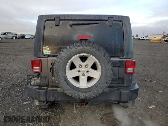 2018 Jeep Wrangler JK Unlimited Sport S with VIN 1C4BJWDG7JL814744, listed as a Copart auction lot 77830714 with 130,229 mi miles and Salvage Title. Bid and sale history available at carsss.com. Image 6.