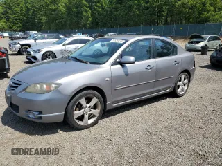 2005 Mazda 3 s with VIN JM1BK323351249227, listed as a Copart auction lot 57938435 with 279,433 mi miles and Salvage title. Bid and sale history available at DreamBid. Image 1.