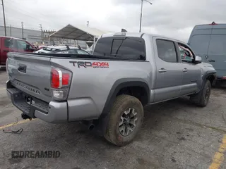 2021 Toyota Tacoma SR z VIN 3TMCZ5AN3MM374132, wystawiony jako IAAI lot #42068562 z przebiegiem 38 654 mil mil oraz . Historia ofert i sprzedaży dostępna na DreamBid. Obrazek 4.