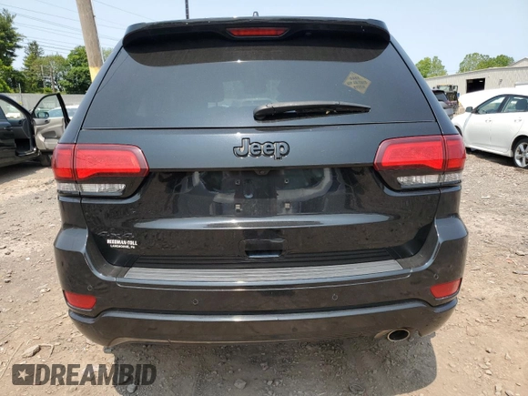 2017 Jeep Grand Cherokee Altitude with VIN 1C4RJFAG5HC892291, listed as a Copart auction lot 58579975 with 71,018 mi miles and Salvage title. Bid and sale history available at DreamBid. Image 6.