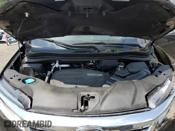 2020 Honda Pilot Touring 8-Passenger with VIN 5FNYF5H95LB021658, listed as a Copart auction lot 58878594 with 36,122 mi miles and Salvage Title. Bid and sale history available at DreamBid. Image 12.