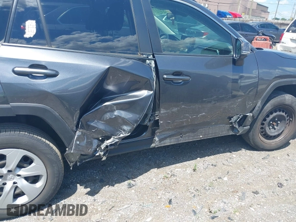 2019 Toyota RAV4 LE with VIN JTMG1RFV9KD014526, listed as a IAAI auction lot 42638858 with 90,995 mi miles and . Bid and sale history available at DreamBid. Image 6.