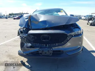 2019 Mazda CX-5 Touring with VIN JM3KFACM1K0533142, listed as a IAAI auction lot 41880181 with Not Provided miles and . Bid and sale history available at carsss.com. Image 12.