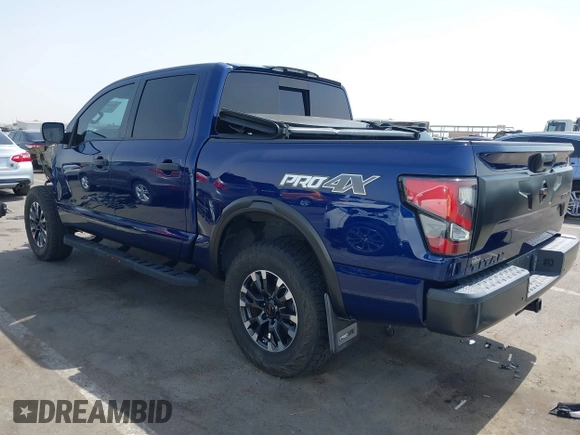 2021 Nissan Titan Pro-4X with VIN 1N6AA1ED3MN531427, listed as a IAAI auction lot 42615123 with 53,695 mi miles and . Bid and sale history available at DreamBid. Image 3.