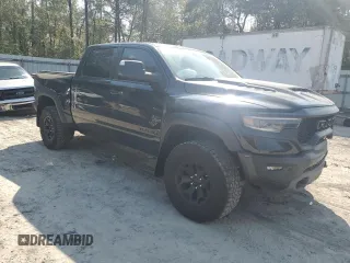 2022 Ram 1500 TRX with VIN 1C6SRFU99NN430718, listed as a Copart auction lot 49576035 with 29,476 mi miles and Salvage title. Bid and sale history available at DreamBid. Image 4.