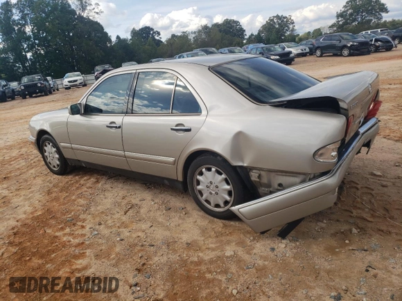 1999 Mercedes-Benz E-Class with VIN WDBJF65HXXA891437, listed as a Copart auction lot 73278334 with 197,159 mi miles and Salvage Title. Bid and sale history available at carsss.com. Image 2.