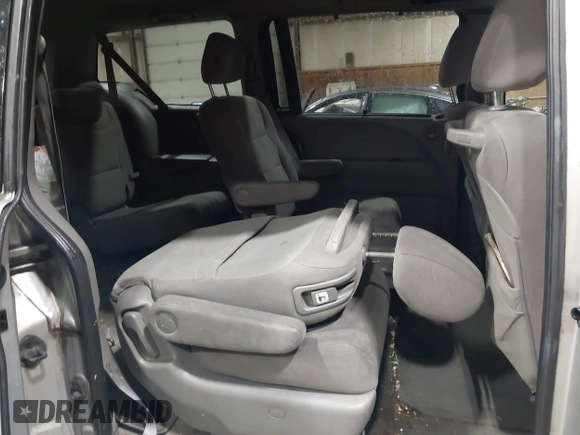 2010 Honda Odyssey EX z VIN 5FNRL3H44AB085662, wystawiony jako IAAI lot #42199416 z przebiegiem 181 221 mil mil oraz . Historia ofert i sprzedaży dostępna na DreamBid. Obrazek 8.