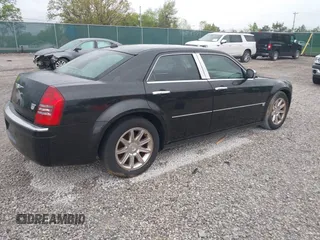 2005 Chrysler 300 with VIN 2C3JA63H05H608145, listed as a IAAI auction lot 42075474 with 167,098 mi miles. Bid and sale history available at carsss.com. Image 4.