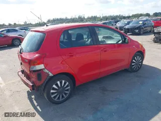 2010 Toyota Yaris with VIN JTDKT4K31A5318034, listed as a IAAI auction lot 41322096 with 114,817 mi miles. Bid and sale history available at carsss.com. Image 4.