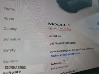 2023 Tesla Model Y Performance with VIN 7SAYGDEF9PF947667, listed as a Copart auction lot 52314795 with 40,634 mi miles and Salvage Title. Bid and sale history available at DreamBid. Image 9.