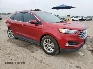 2020 Ford Edge SEL с VIN 2FMPK3J96LBA69376, выставлен на аукционе Copart как лот 57553395 с пробегом 69 468 миль миль и Списание • Salvage title. История ставок и продаж доступна на DreamBid. Изображение 4.