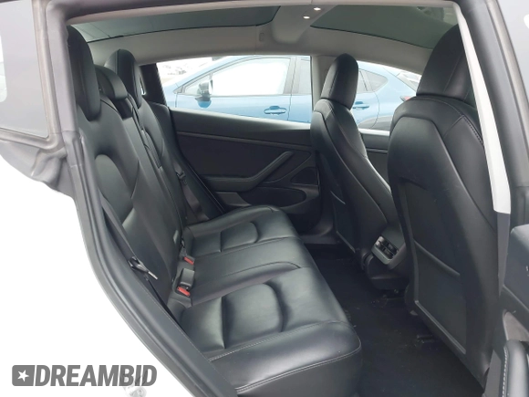 2020 Tesla Model 3 Standard Range Plus z VIN 5YJ3E1EAXLF806438, wystawiony jako IAAI lot #42104964 z przebiegiem 89 065 mil mil oraz . Historia ofert i sprzedaży dostępna na DreamBid. Obrazek 8.
