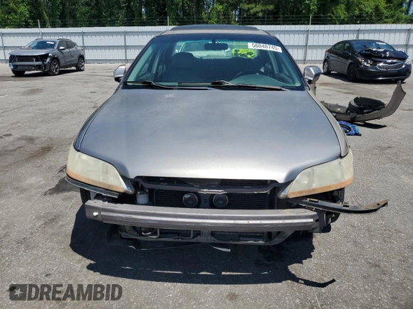 2000 Honda Accord EX с VIN 1HGCG1651YA085715, выставлен на аукционе Copart как лот 56040745 с пробегом 316 369 миль миль и Списание • Salvage title. История ставок и продаж доступна на DreamBid. Изображение 5.