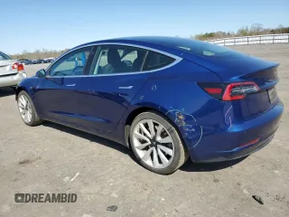 2019 Tesla Model 3 Mid Range with VIN 5YJ3E1EA6KF412837, listed as a Copart auction lot 50871195 with 39,570 mi miles and Salvage Title. Bid and sale history available at DreamBid. Image 2.