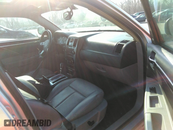 2007 Chrysler 300 Touring with VIN 2C3LA53G57H785979, listed as a IAAI auction lot 36241614 with 220,841 mi miles. Bid and sale history available at carsss.com. Image 5.