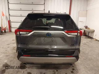 2023 Toyota RAV4 Hybrid XSE with VIN 4T3E6RFV7PU124140, listed as a IAAI auction lot 42201073 with 50,942 mi miles and . Bid and sale history available at DreamBid. Image 16.