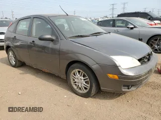 2005 Ford Focus S with VIN 3FAFP37NX5R134987, listed as a Copart auction lot 60478825 with 204,927 mi miles and Clean title. Bid and sale history available at DreamBid. Image 4.